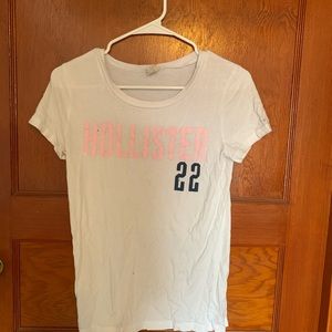 White Hollister shirt with pink lettering
